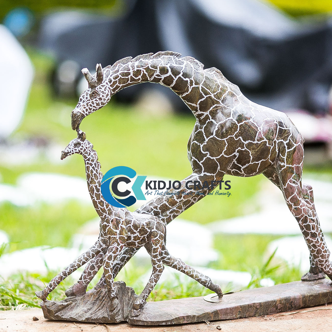 Njoki consulting with a client on personalized art selections